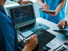 Gesundheitsberufe, Teambesprechung im Krankenhaus